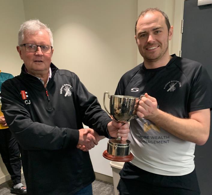 County Club vice-chairman Martin Jones presents the trophy to Sean Hannon County Club vice-chairman Martin Jones presents the trophy to Sean Hannon